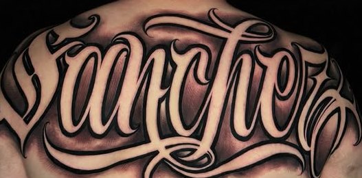 Custom script tattoo, upper back