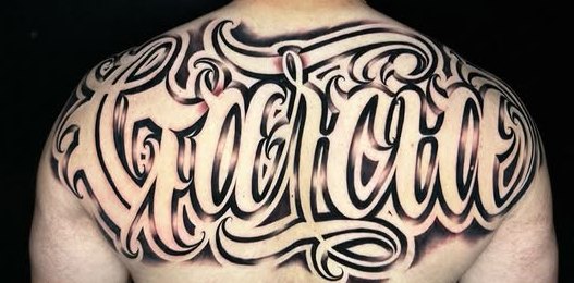 Custom script tattoo, upper back