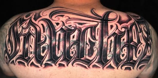 Custom script tattoo, upper back